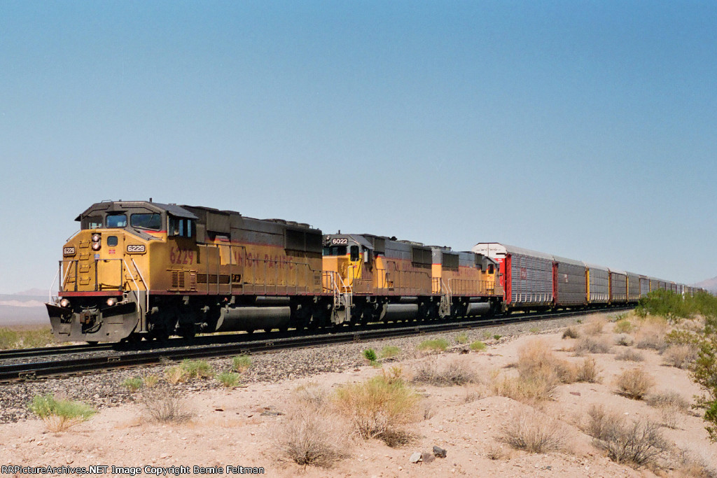 Union Pacific SD60M #6229 and SD60's #6022 & 6005 lead an autorack train 